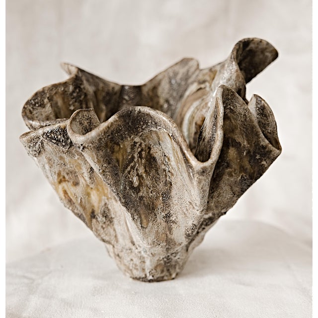 Experience the exquisite artistry of the Flourish Series ofVases at The Shine Studios, where each piece will be Varying...