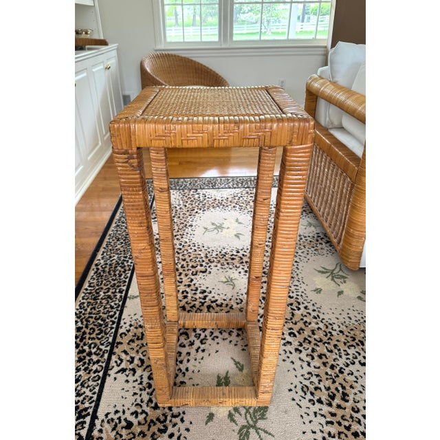 Imported from Hong Kong, woven rattan tall plant stand. Great size. And in excellent vintage condition.