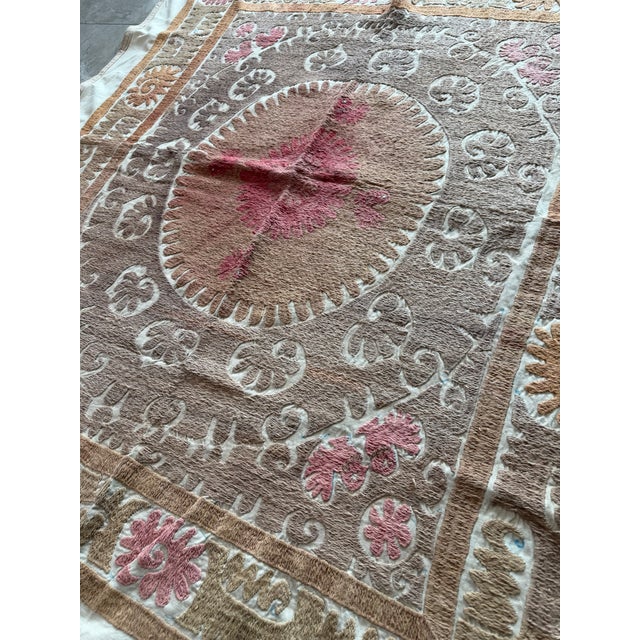 Vintage Embroidery Suzani from Asian, circa 1960s. There are stains on this suzani. Dimension; 55'' x 58'' inches / 140 x...