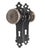 Arts & Crafts style passage door knob set made of cast iron with a black and steel finish. The original mounting screws...