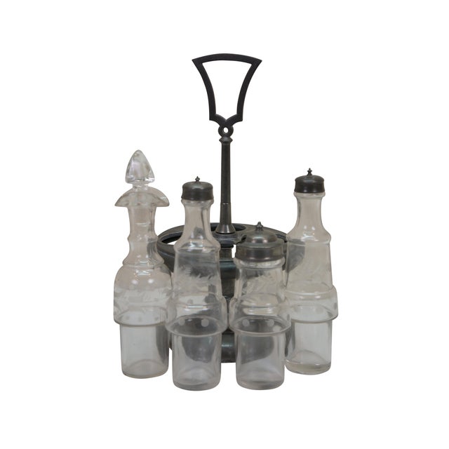 Antique Victorian cruet condiment set featuring etched glass bottles with footed silverplate caddy Dimensions: 6.25" x...
