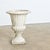 This single garden urn from the early 1900s is made of reconstructed stone. The campana silhouette planter has a unique...