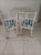 1970s Metal Dining Patio Set Square Table Glass Top White Chairs on Wheels Set of 3 For Sale - Image 4 of 7