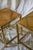Pair of 1970s side tables featuring a geometric square-section brass frame. Clear glass tops with woven rush underneath,...