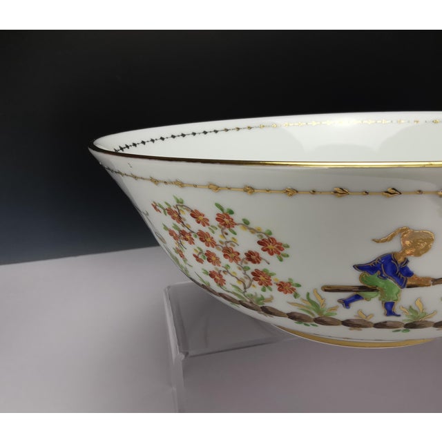 Rare and superb limoges porcelain salad bowl by camille le tallec, "chinese circus" pattern hand-painted and gilded with...