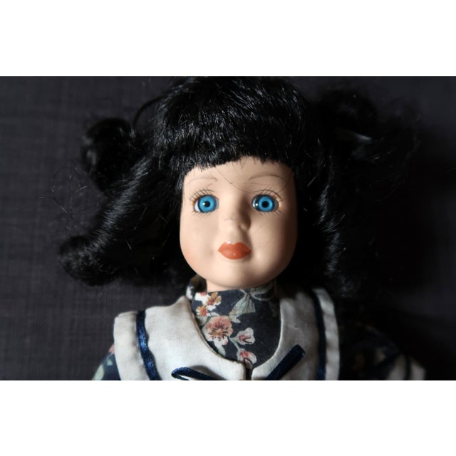 Elegant Vintage Porcelain Doll | Blue and White Beauty from the 20th Century Step into a World of Timeless Elegance...
