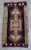 a Vintage Turkish Small yastik rug, dark byzantium color background yastik rug perfect for entryway, bath or in front of...