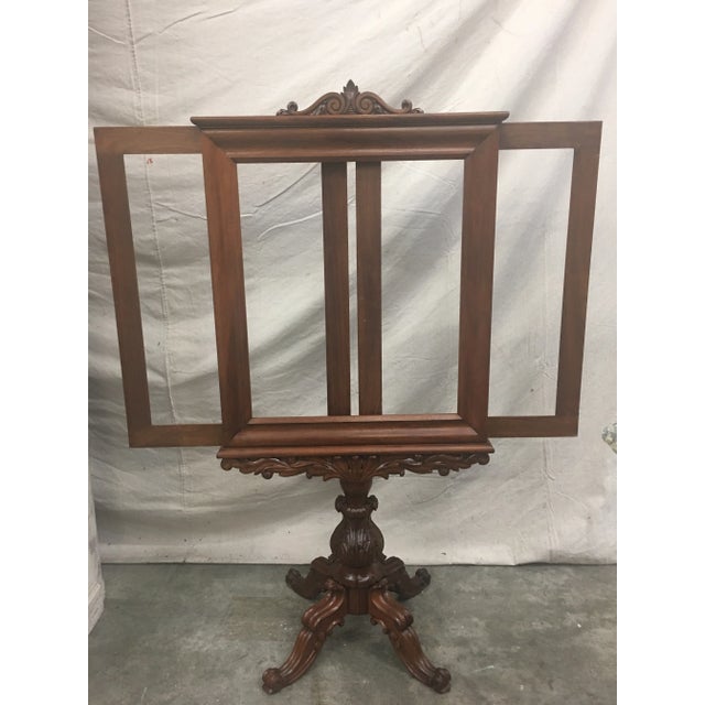 Beautiful English antique mahogany fireplace screen, featuring expandable panels, and a carved pedestal base. This lovely...