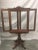 Beautiful English antique mahogany fireplace screen, featuring expandable panels, and a carved pedestal base. This lovely...