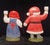 A highly collectible pair of hand-painted porcelain holiday candleholders designed by renowned Swedish ceramicist Lisa...