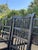 Early 21st Century Set of 6 Vintage Black Painted Spindle-Back & Ladder-Back Rush Seat Dining Chairs For Sale - Image 5 of 12