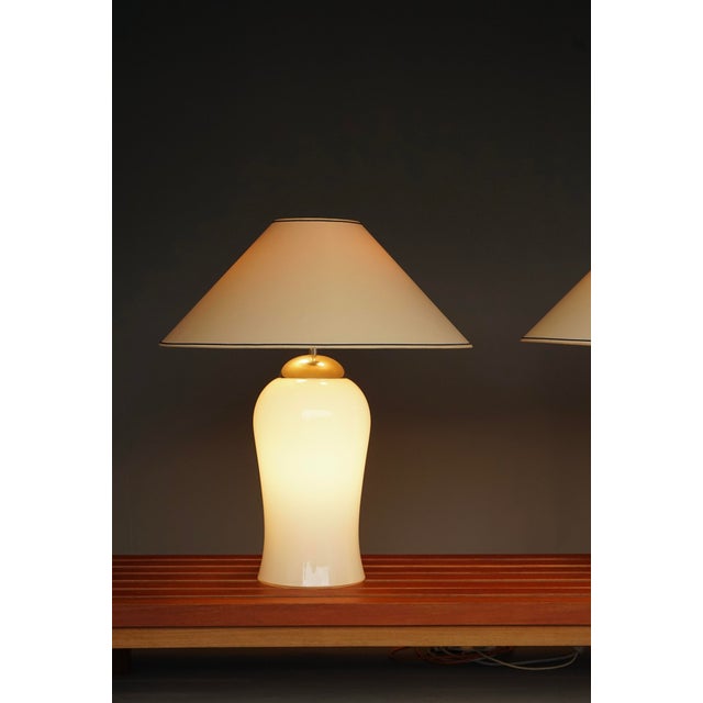 pair of rare table or floor lamps. The model name is “Tschung” by Ingo Maurer was produced by M-Design in the 1980s and...