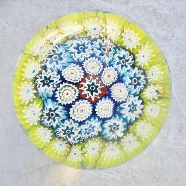 Mid-20th Century Large Murano Glass Millefiori Paperweight. Very happy colorful milleflora bouquet in the crystal weight....