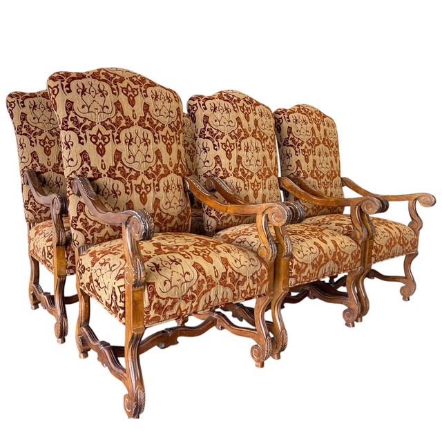 Century Furniture “Amelia” arm dining chairs, offered as a set of six. Elegant carved wood frames with scrolled arms,...
