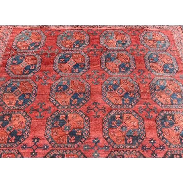 Early 20th Century Hand-Knotted Turkomen Ersari Rug in Wool With Gul Design in Red, Orange and Blue For Sale - Image 4 of 13