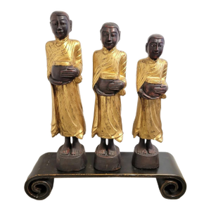 Set of Three Large Carved Gilt Thai Monks on Scroll Base, Late 20th Century