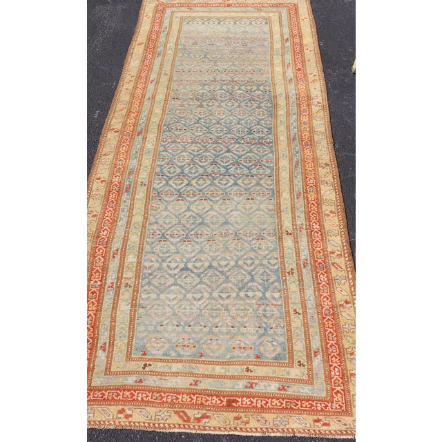 Measures: 3'6"X10'0" Antique Kurdish Runner With Geometric Motifs and Soft Color Palette 3'6"x10'0". Antique Kurdish Rug...
