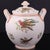 Twin looped shoulder handles frame this bulbous parian pot pourri vase, modelled in unglazed matte white porcelain....