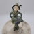 Vintage Art Deco cold painted spelter figure mounted on a natural marble tray. This piece features a character in...