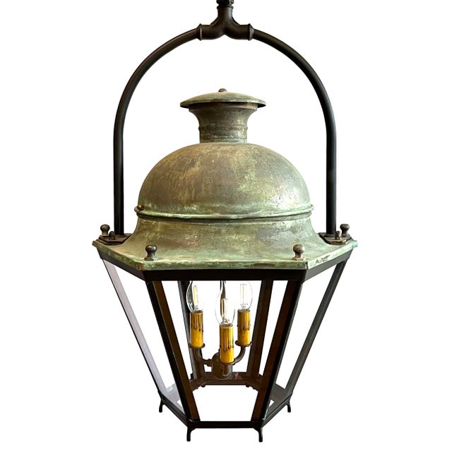 Rare pair of late 19th century hexagonal French Lanterns. Each features original natural verdigris patinated copper dome...