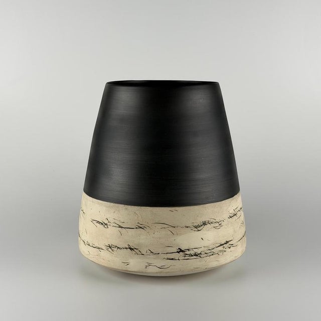 A beautiful large ceramic vase designed, produced and signed by Rina Menardi, Italy, circa 1980s. This striking piece...