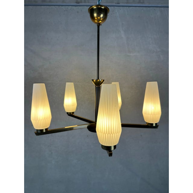 Very beautiful 1950s hanging lamp with brass and opaline parts. 5 opaline (plié) tubes in perfect condition. Beautiful in...