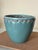 Dark Teal ‘crazed’ glazed ceramic pot with flat woven rattan collar. Dark teal tone with no nicks, scratches or damaged...