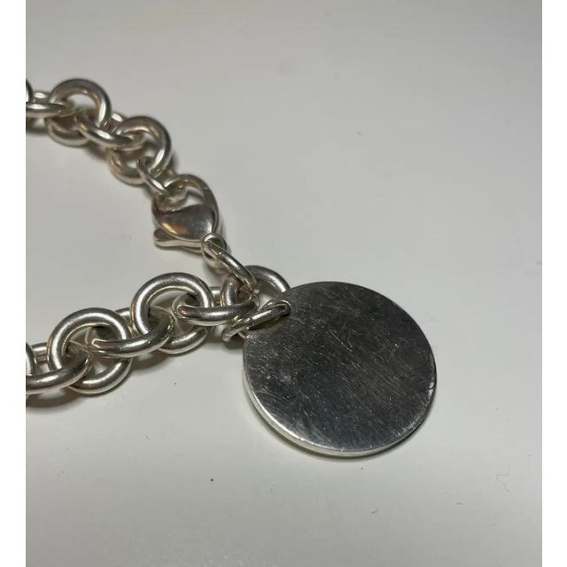 Silver Vintage 1990s Tiffany & Co. Sterling Silver Engravable Round Tag Bracelet – 36.21g For Sale - Image 8 of 8