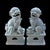 This stunning pair of ceramic foo dogs showcases traditional Chinese craftsmanship with a beautiful celadon crackle glaze...