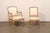 A set of ten carved and upholstered French dining chairs from the mid-20th century. This mid-century set of chairs from...