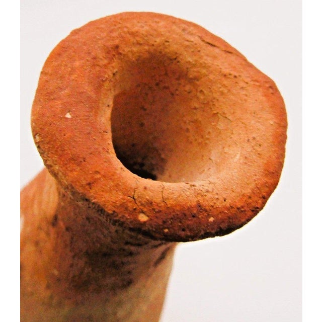 Ancient Terracotta Elongated Piriform Body Transport Amphora on Stand For Sale - Image 11 of 13