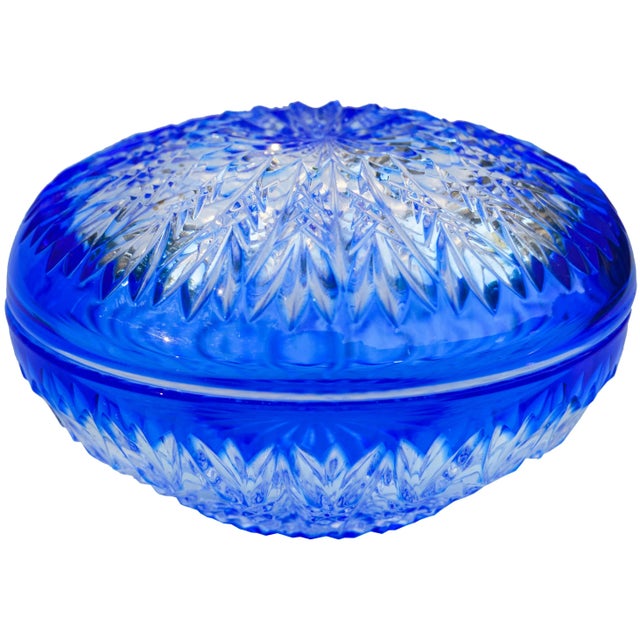 Midcentury blue crystal lidded bowl with elegantly hand-cut motif and intricate details. No maker's mark. This gorgeous...