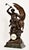 An exceptional Antique French patinated bronze figural sculpture clock titled Lutte Préhistorique ("Prehistoric...
