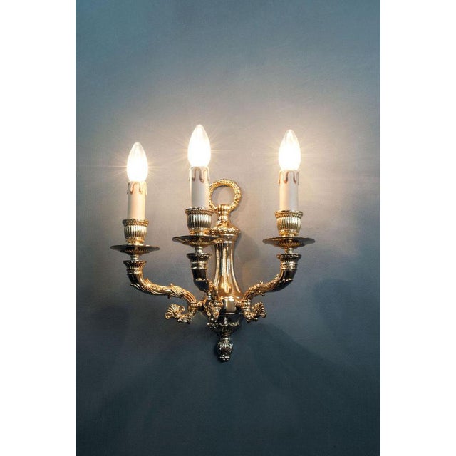 Palace 3 lights wall sconce in gold plate by aggiolight. Dimensions: w 33 x d 22 x h 34 cm. Materials: gold plate....
