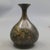 Embrace the beauty of imperfection with this charming vintage-style bronze vase. Featuring a classic Chinese "Pear" shape...