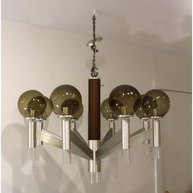 This stunning mid century modern chandelier is reminiscent of Robert Sonneman's famous lollipop globe lighting from the...