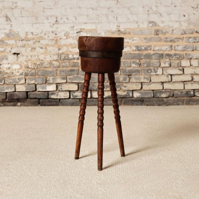 Add rustic French character and functional charm to your space with this 19th century French wooden block table, a...