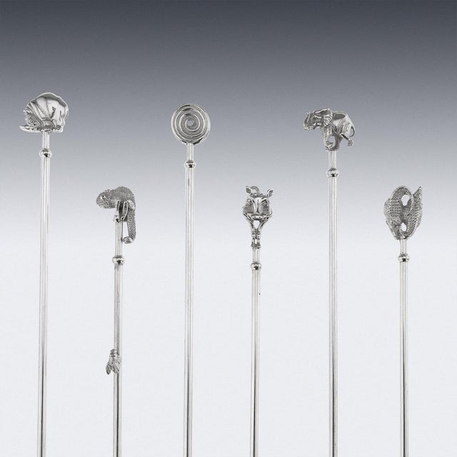 Ptrick mavros solid silver set of six cocktail spoons, decorated with cast figures of african animals. The set comes in...