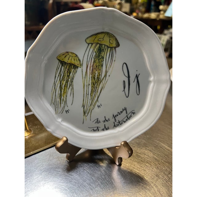 Up for consideration is a beautiful vintage white ceramic decorative plate with jellyfish accents. This is a lovely piece...