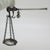 Vintage silver collectible featuring a handcrafted miniature depiction of a traditional handheld steelyard scale,...