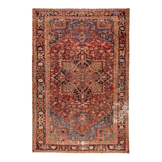 Early 20th Century Antique Distressed Persian Heriz Wool Rug For Sale