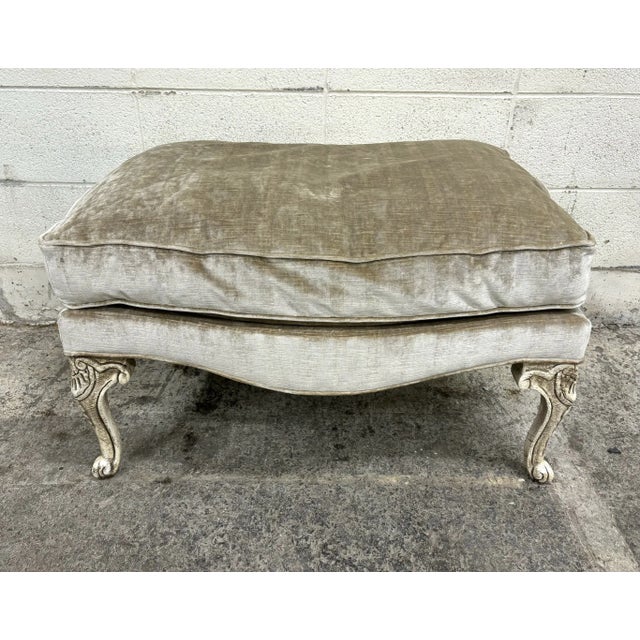 This is an absolutely gorgeous Louis XV ivory carved ottoman with striped fabric. Painted and distressed legs,...