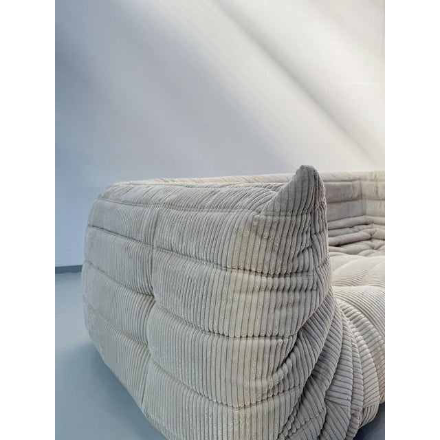 This Togo has been reupholstered with new foam and leather, preserving its shape & iconic looks.The bottom could show some...