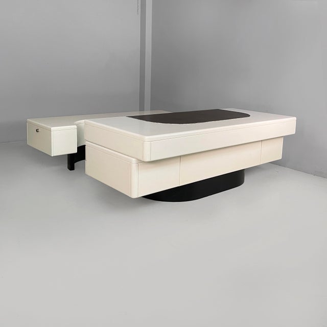 Italian modern wood, steel and leather desk attributed by Fabio Lenci, 1970s Desk for center of the room with a C-shaped...