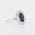Pompadour ring from the Art Deco period circa 1925 in platinum. It is adorned with a central oval sapphire of...