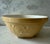 Vintage butter yellow and cream stoneware Gripstand mixing bowl made in England by T.G. Green circa 1930s. Bowl features...