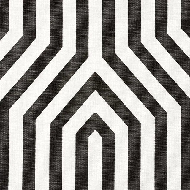 We introduced this large-scale, ziggurat design as a luxe cut velvet. Now, we've translated it into a fun, graphic print...