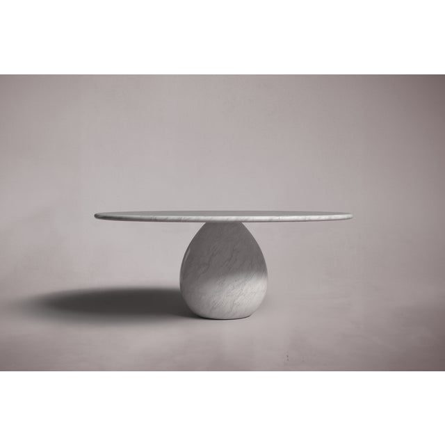 Crafted and hand-finished from solid blocks of Italian Carrara Marble, each piece exhibits the inherent variations in...