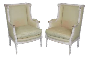 Exceptional Pair of French Louis XVI Style Creme Painted Bergere Chairs