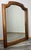 This elegant Vintage French mirror offers a warm and refined presence, crafted with a beautifully shaped oak frame and a...